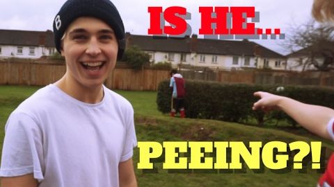 IS HE... PEEING IN PUBLIC?!